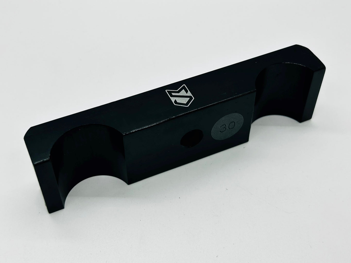 Black anodized aluminum lower engine mount/wrap bracket with a 30mm to -92mm range, displaying a logo on the side.