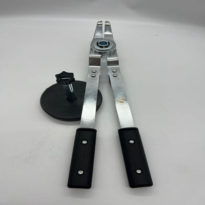 Metal tool with black handles on a white background